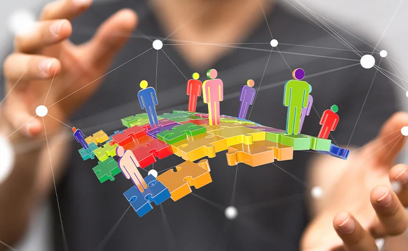 image of people standing on puzzle pieces representing staffing augmentation