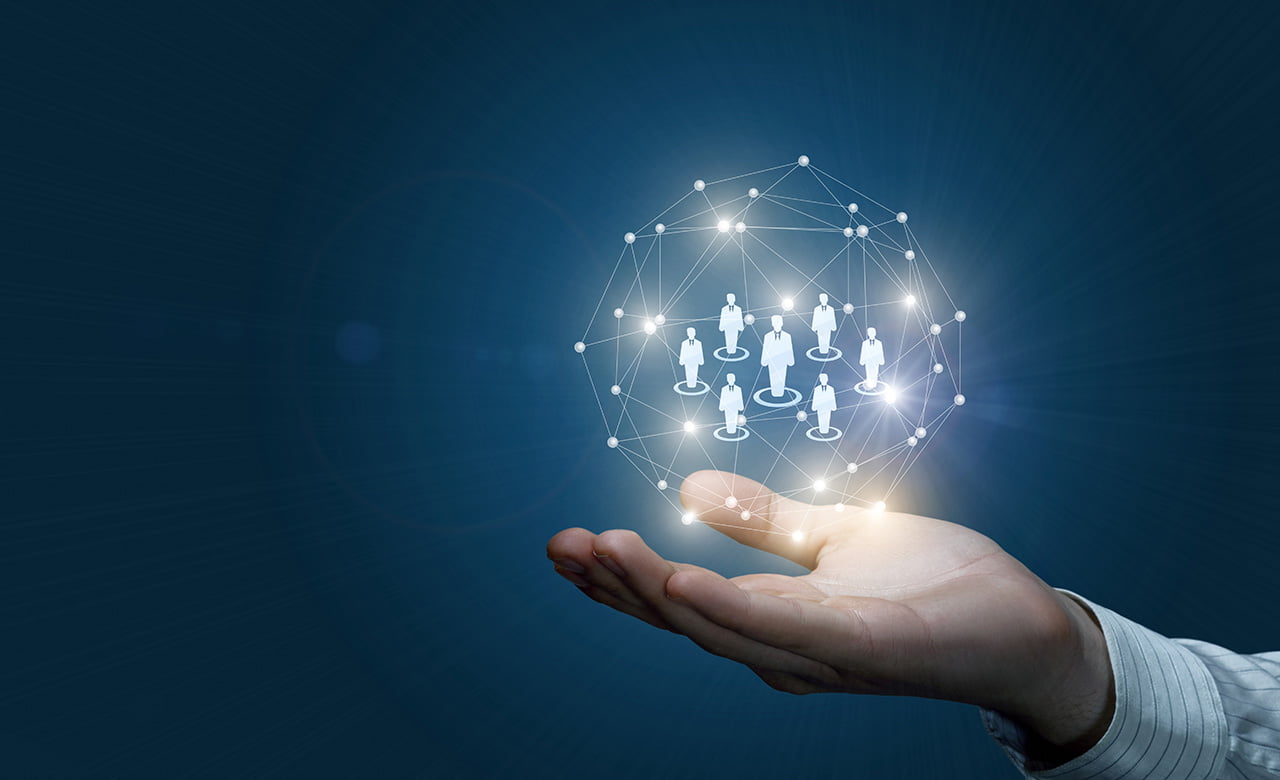 Image of hand holding a network of people representing staffing augmentation